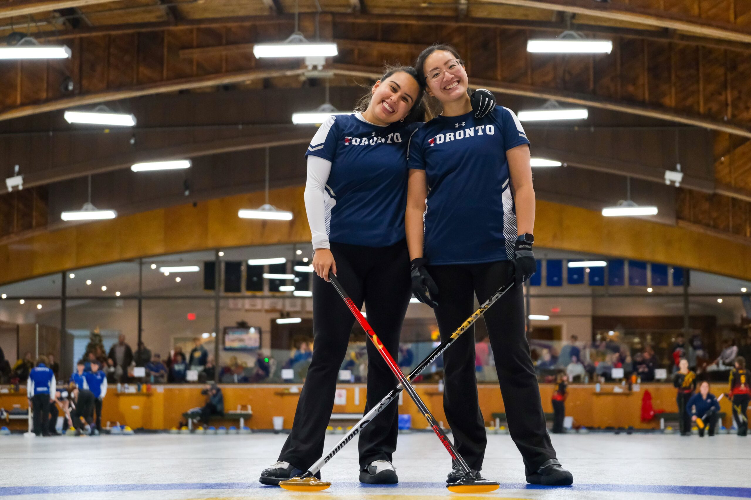 Danielle Serra (left) and Janice Pang (right) are two BME students on the University of Toronto’s Varsity Curling team.