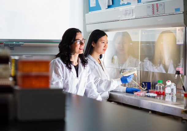 Milica Radasic in a lab with graduate student